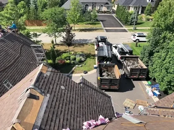Aerial view of a shingle tear-off in progress